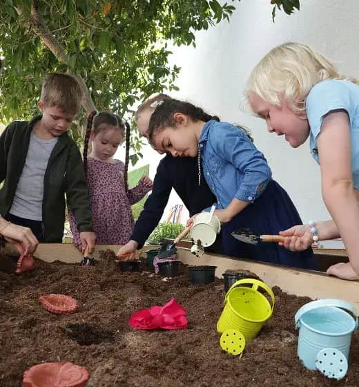 Children cooking and creating at Woodland Kitchen, Forest Oasis Nursery