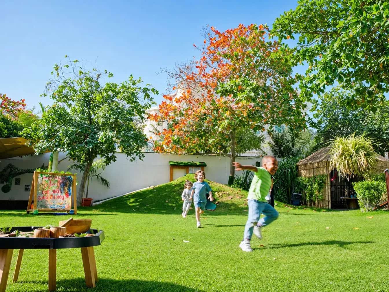 Thirty Years of Doing What's Right for Children Children playing outdoors at Forest Oasis Nursery